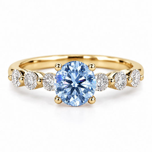 Blue Round Cut Lab Grown Diamond Engagement Ring - Marquise and Round Station Band in yellow gold, front view