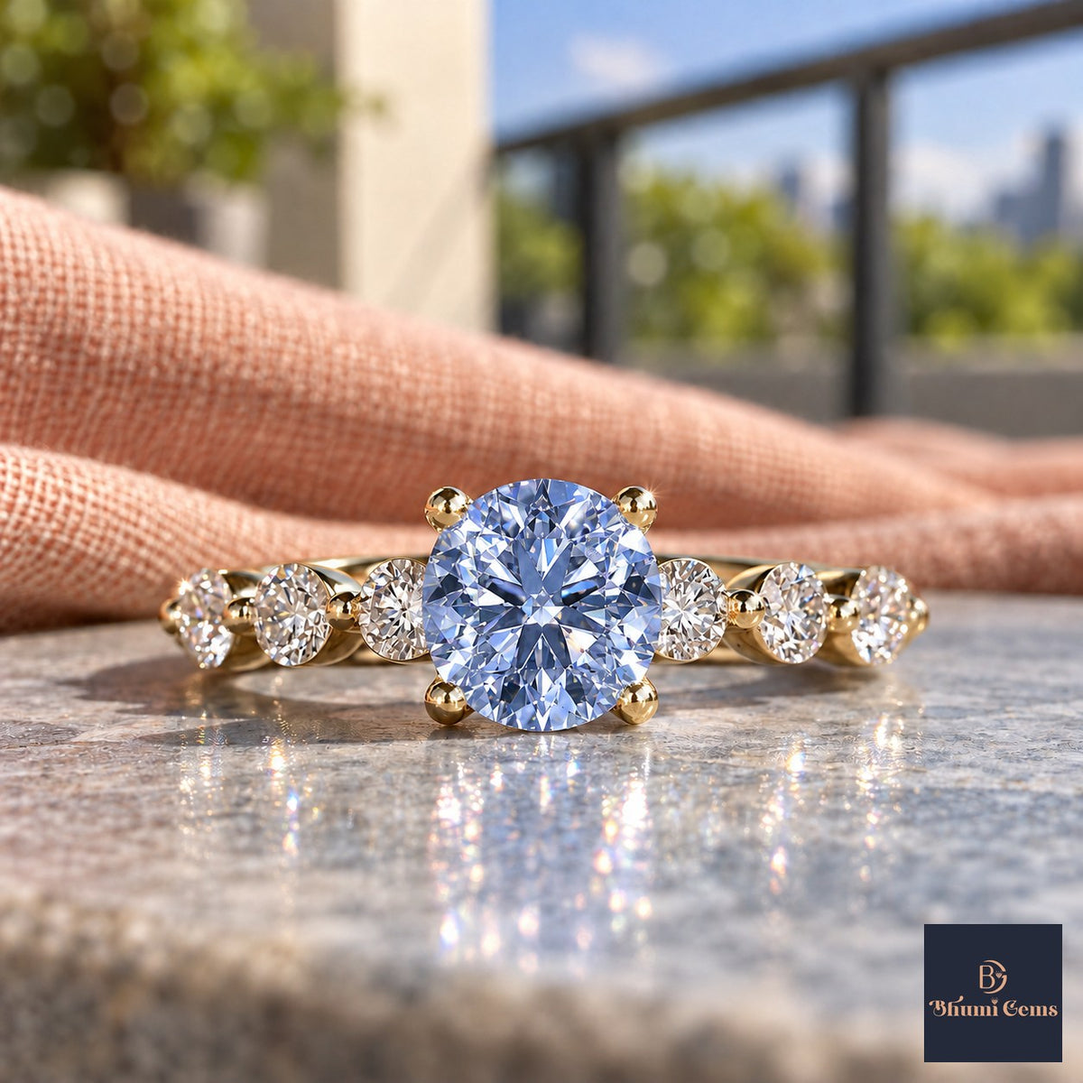 Blue Round Cut Lab Grown Diamond Engagement Ring - Marquise and Round Station Band in yellow gold, close-up