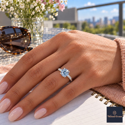 Blue Round Cut Lab Grown Diamond Engagement Ring - Pave Shoulders in white gold, worn on the hand
