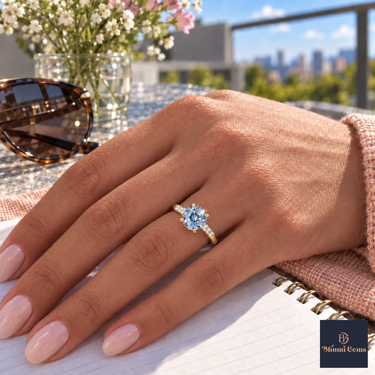 Blue Round Cut Lab Grown Diamond Engagement Ring - Pave Shoulders in yellow gold, worn on the hand