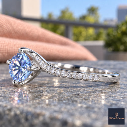 Blue Round Cut Lab Grown Diamond Engagement Ring - Pave Twist Bypass in white gold, side view