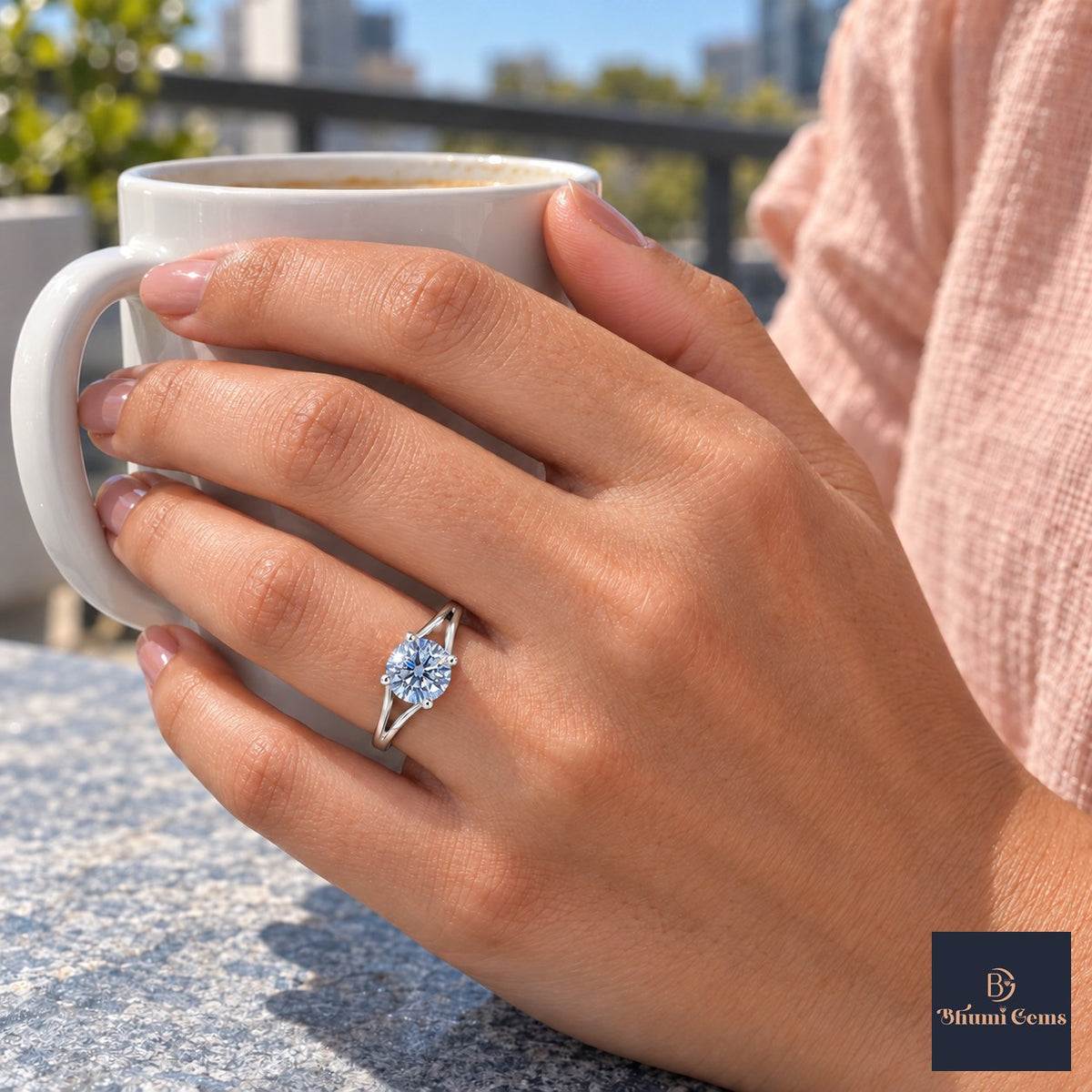 Blue Round Cut Lab Grown Diamond Engagement Ring - Split Shank in white gold, worn on the hand