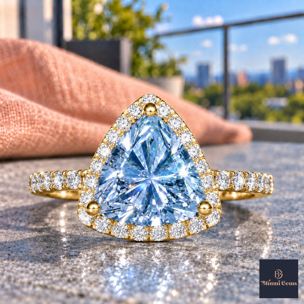 Blue Trillion Cut Lab Grown Diamond Engagement Ring - Halo in yellow gold, close-up