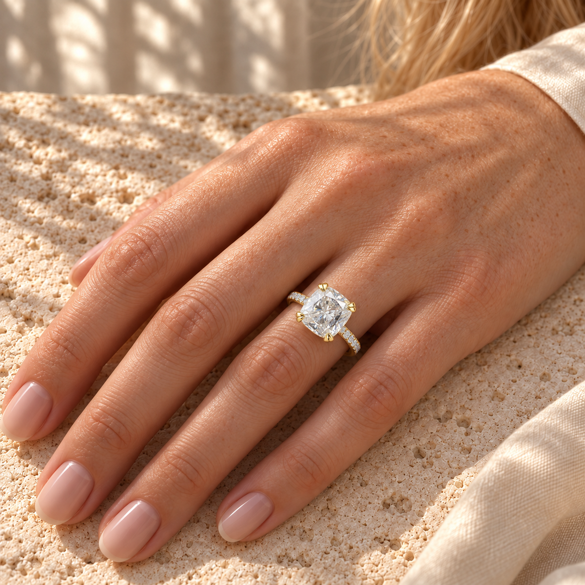 3.39TCW Cushion Colorless Moissanite Engagement Ring - Double Claw Pave Band - Yellow gold - worn on the hand