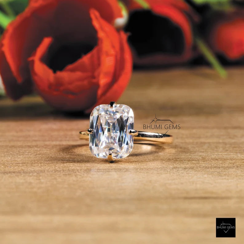 emerlad criss cut moissanite engagement ring