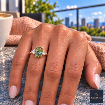 Green Elongated Cushion Cut Lab Grown Diamond Engagement Ring - Trillion Three Stone in rose gold, on the hand