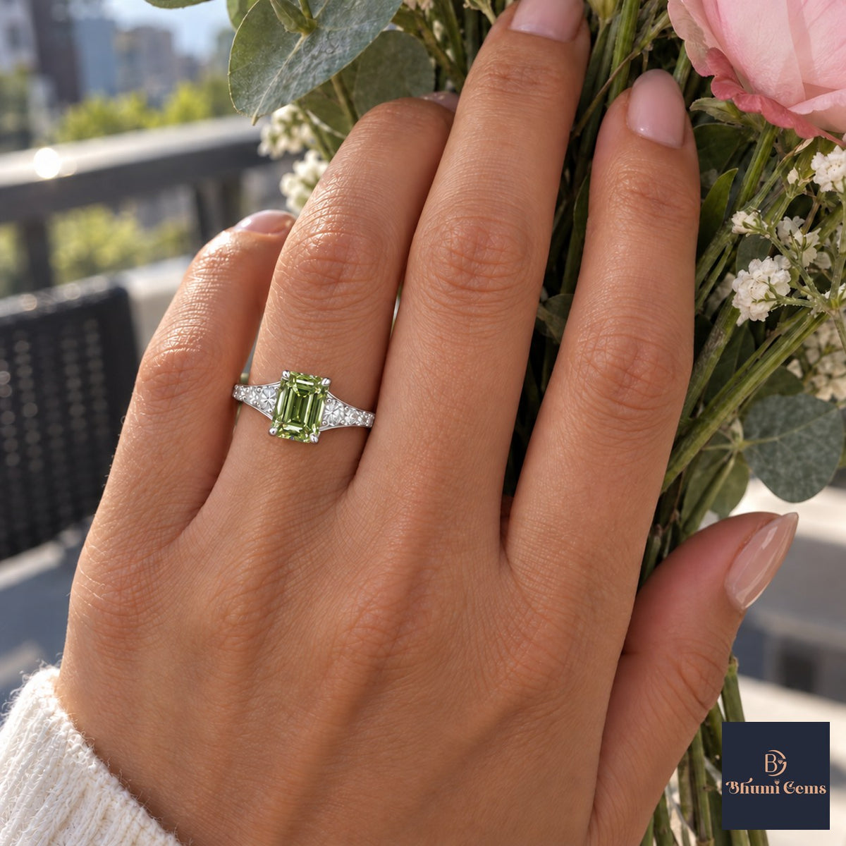 Green Emerald Cut Lab Grown Diamond Engagement Ring - Graduated Pave Shoulders in white gold, worn on the hand