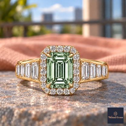 Green Emerald Cut Lab Grown Diamond Engagement Ring - Halo and Baguette Shoulders in yellow gold, close-up