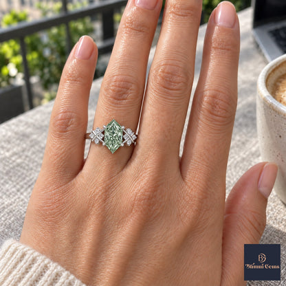 Green Hexagon Cut Lab Grown Diamond Engagement Ring - Cluster Shoulders in white gold, on the hand