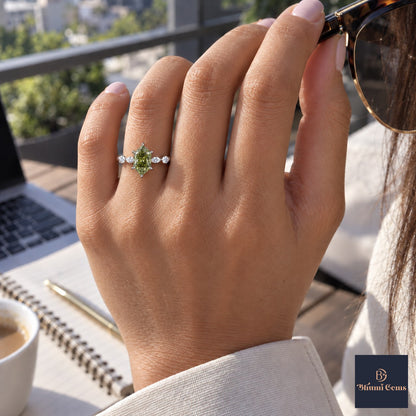 Green Hexagon Cut Lab Grown Diamond Engagement Ring - Marquise and Round Accents in white gold, worn on the hand