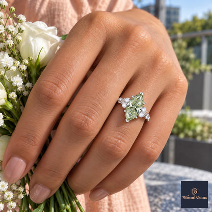 Green Marquise Cut Lab Grown Diamond Engagement Ring - Cluster Vine Band in white gold, on the hand