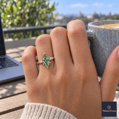 Green Marquise Cut Lab Grown Diamond Engagement Ring - Round Accents in rose gold, on the hand