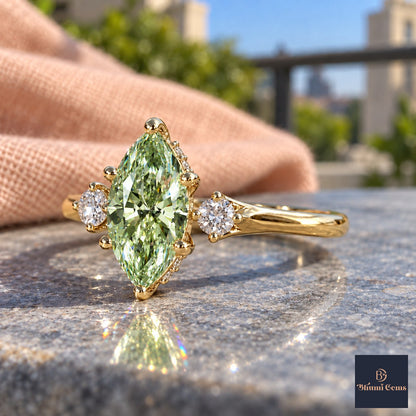 Green Marquise Cut Lab Grown Diamond Engagement Ring - Three Stone in yellow gold, side view