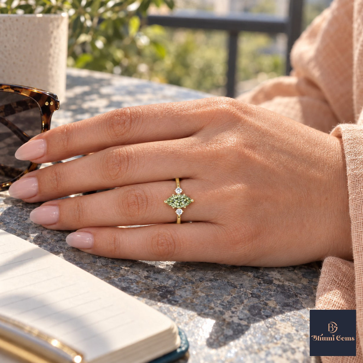 Green Marquise Cut Lab Grown Diamond Engagement Ring - Three Stone in yellow gold, on the hand