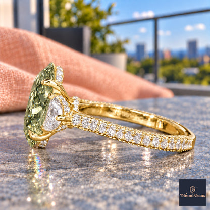 Green Oval Cut Lab Grown Diamond Engagement Ring - Half Moon Pave in yellow gold, side view