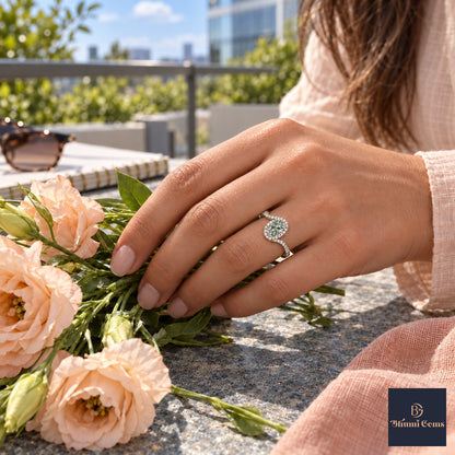 Green Oval Cut Lab Grown Diamond Engagement Ring - Halo Bypass in white gold, worn on the hand