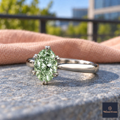 Green Oval Cut Lab Grown Diamond Engagement Ring - Heart Prong Solitaire in white gold, close-up