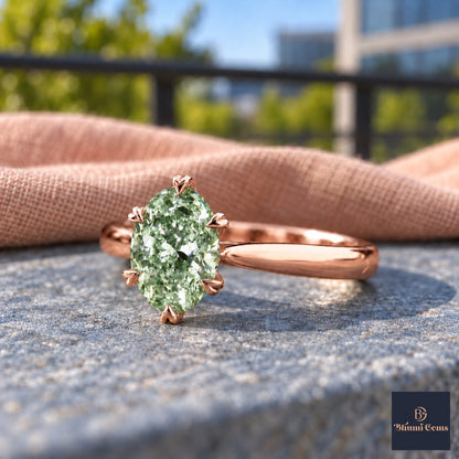 Green Oval Cut Lab Grown Diamond Engagement Ring - Heart Prong Solitaire in rose gold, close-up