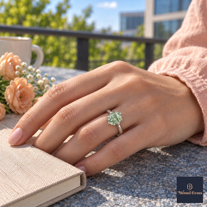 Green Oval Cut Lab Grown Diamond Engagement Ring - Heart Prong Solitaire in white gold, worn on the hand
