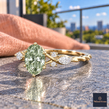 Green Oval Cut Lab Grown Diamond Engagement Ring - Leaf Cluster Shoulders in yellow gold, side view