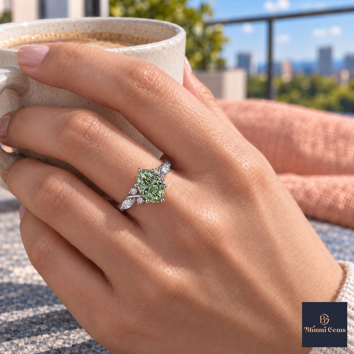 Green Oval Cut Lab Grown Diamond Engagement Ring - Leaf Cluster Shoulders in white gold, on the hand