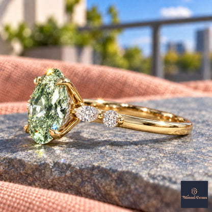 Green Oval Cut Lab Grown Diamond Engagement Ring - Marquise and Round Accents in yellow gold, side view