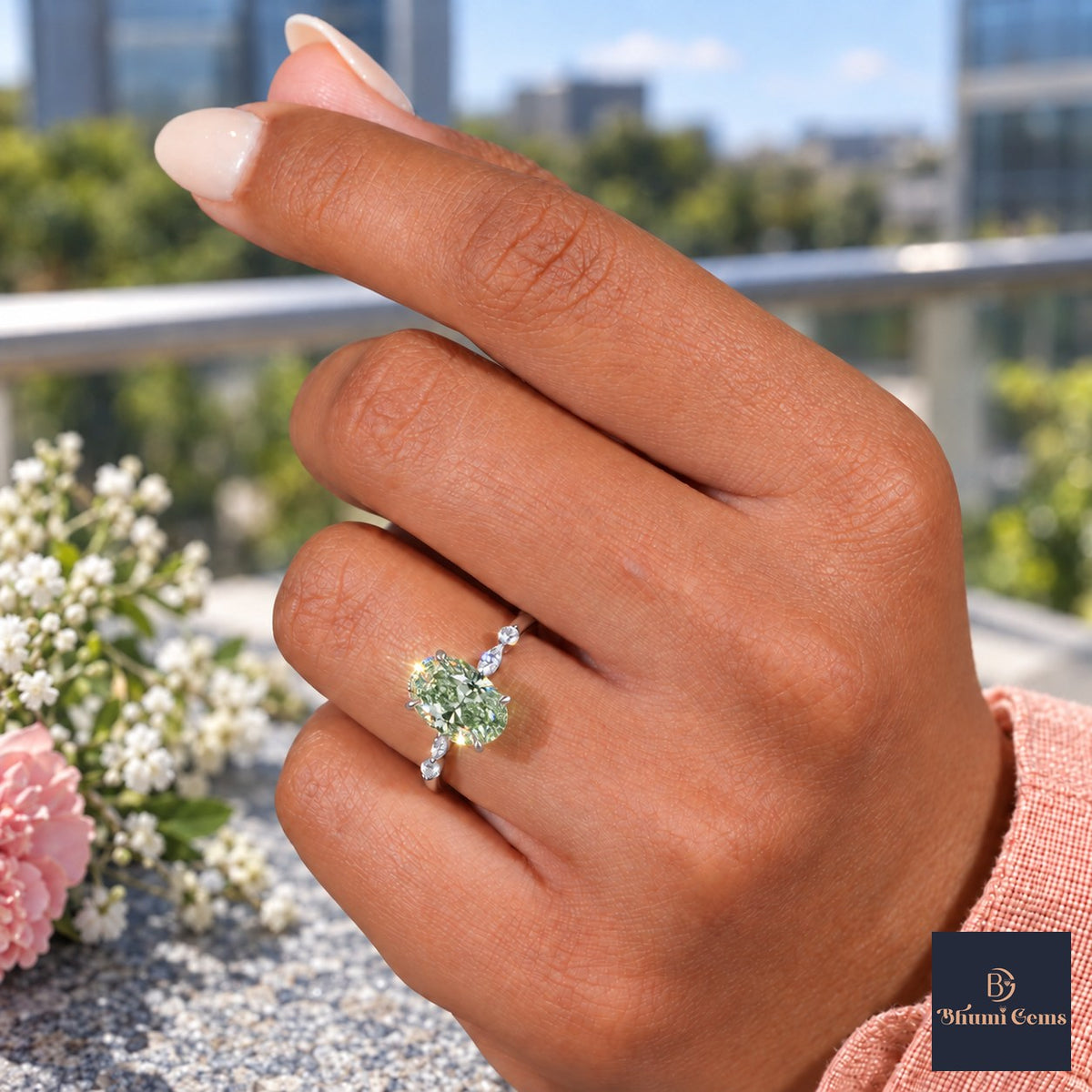 Green Oval Cut Lab Grown Diamond Engagement Ring - Marquise and Round Accents in white gold, worn on the hand