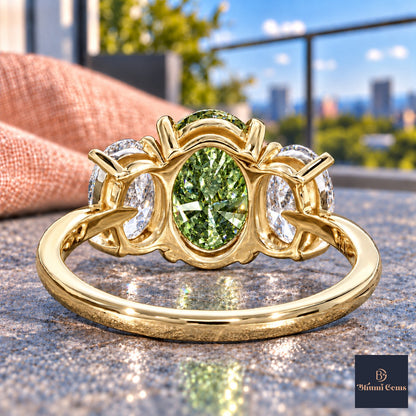 Green Oval Cut Lab Grown Diamond Engagement Ring - Oval Three Stone in yellow gold, gallery view