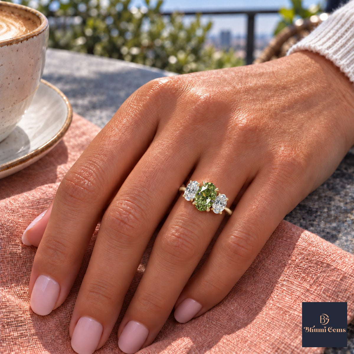 Green Oval Cut Lab Grown Diamond Engagement Ring - Oval Three Stone in yellow gold, on the hand