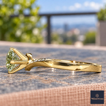 Green Oval Cut Lab Grown Diamond Engagement Ring - Pave Twist Bypass in yellow gold, side view