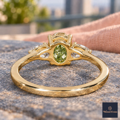 Green Oval Cut Lab Grown Diamond Engagement Ring - Pear Side Stones in yellow gold, gallery view