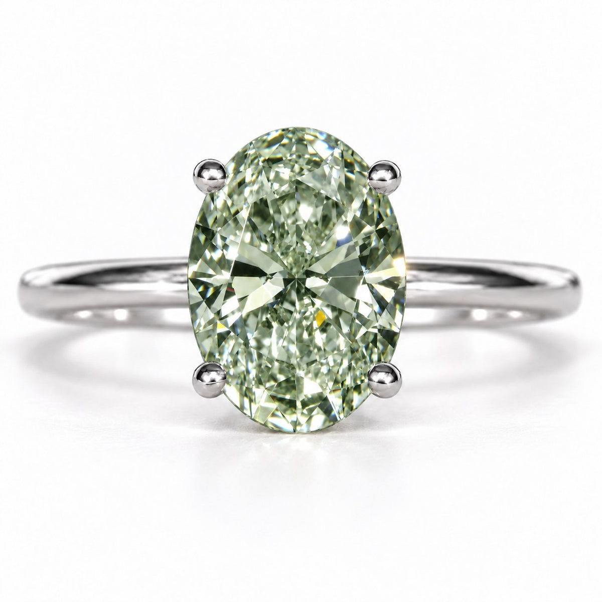 Green Oval Cut Lab Grown Diamond Engagement Ring - Six Prong Solitaire in white gold, front view