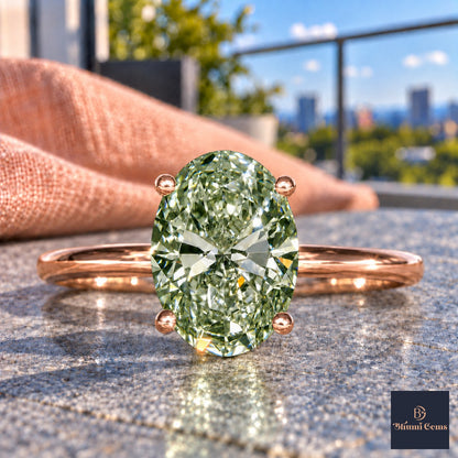 Green Oval Cut Lab Grown Diamond Engagement Ring - Six Prong Solitaire in rose gold, close-up