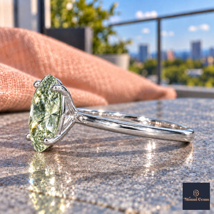 Green Oval Cut Lab Grown Diamond Engagement Ring - Six Prong Solitaire in white gold, side view