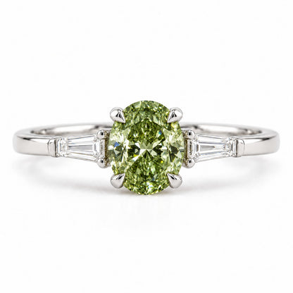 Green Oval Cut Lab Grown Diamond Engagement Ring - Tapered Baguettes in white gold, front view