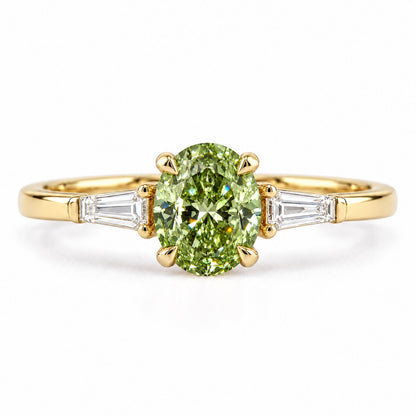 Green Oval Cut Lab Grown Diamond Engagement Ring - Tapered Baguettes in yellow gold, front view
