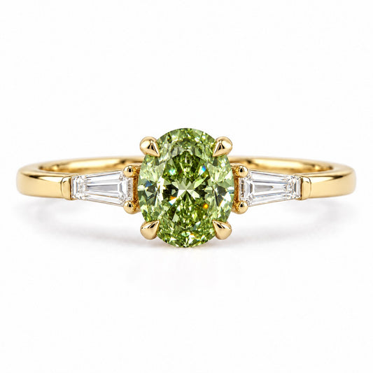 Green Oval Cut Lab Grown Diamond Engagement Ring - Tapered Baguettes in yellow gold, front view