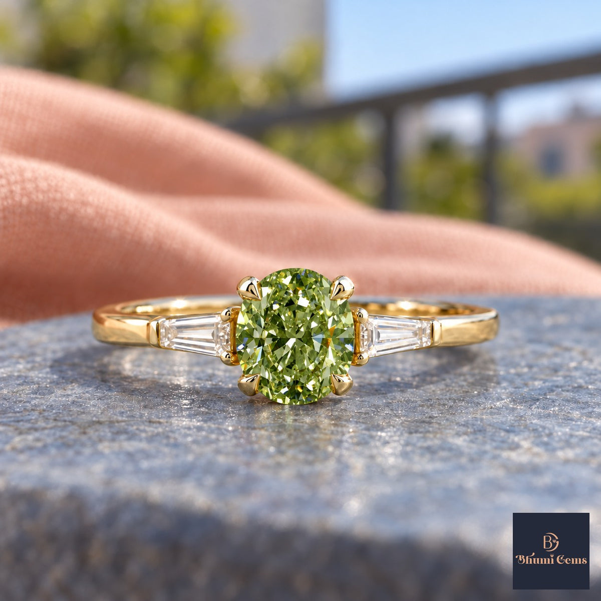 Green Oval Cut Lab Grown Diamond Engagement Ring - Tapered Baguettes in yellow gold, close-up