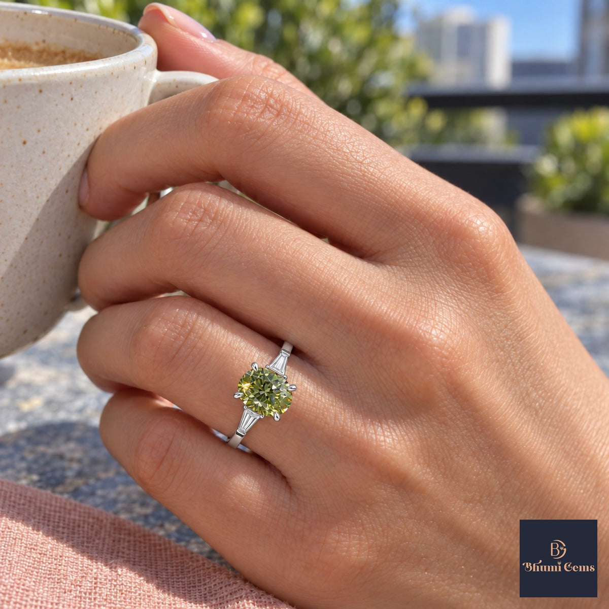Green Oval Cut Lab Grown Diamond Engagement Ring - Tapered Baguettes in white gold, on the hand
