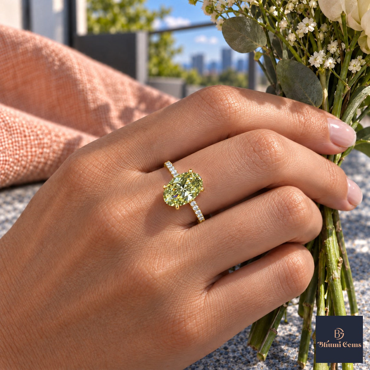 Green Oval Cut Lab Grown Diamond Engagement Ring - Thin Pave Band in yellow gold, worn on the hand