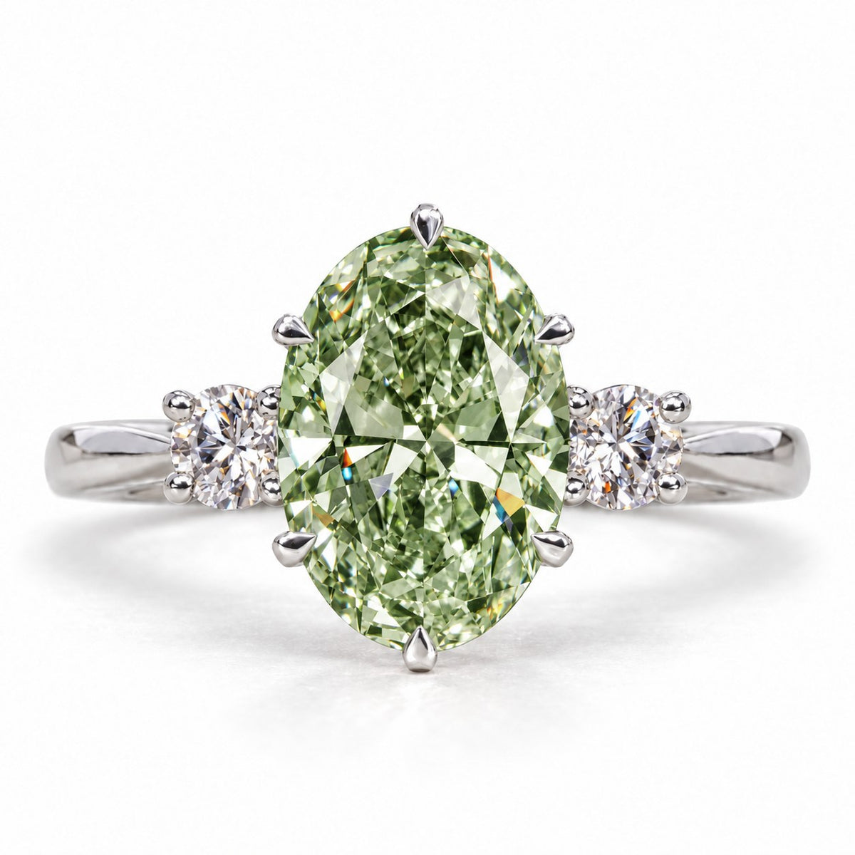 Green Oval Cut Lab Grown Diamond Engagement Ring - Three Stone in white gold, front view