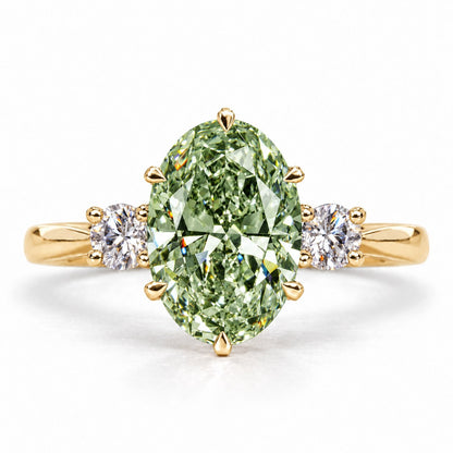 Green Oval Cut Lab Grown Diamond Engagement Ring - Three Stone in yellow gold, front view