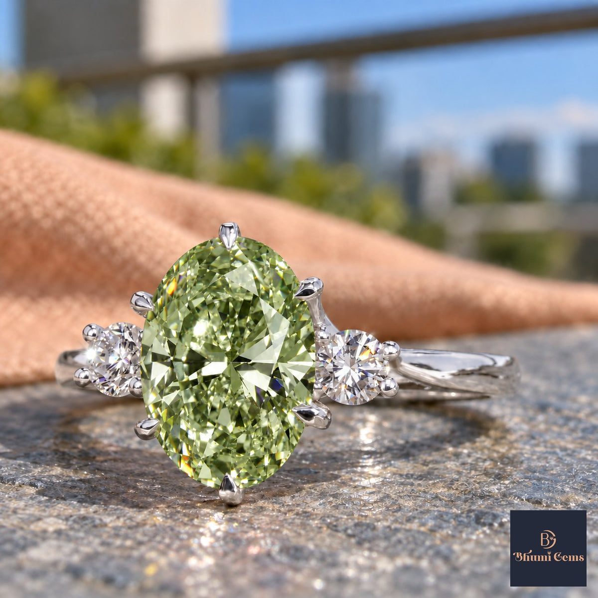 Green Oval Cut Lab Grown Diamond Engagement Ring - Three Stone in white gold, close-up