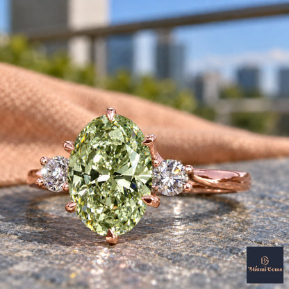 Green Oval Cut Lab Grown Diamond Engagement Ring - Three Stone in rose gold, close-up