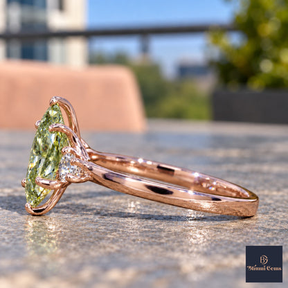 Green Oval Cut Lab Grown Diamond Engagement Ring - Three Stone in rose gold, side view
