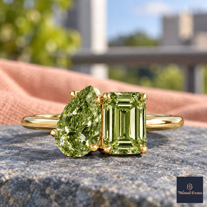 Green Pear and Emerald Cut Lab Grown Diamond Engagement Ring - Toi et Moi in yellow gold, close-up