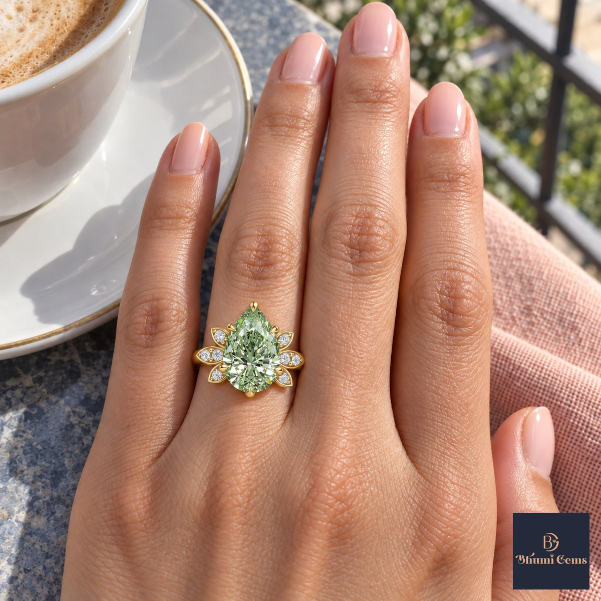 Green Pear Cut Lab Grown Diamond Engagement Ring - Floral Leaf Accents in yellow gold, on the hand
