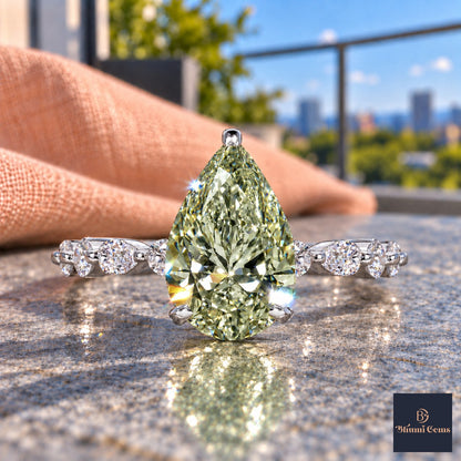Green Pear Cut Lab Grown Diamond Engagement Ring - Navette Band in white gold, close-up