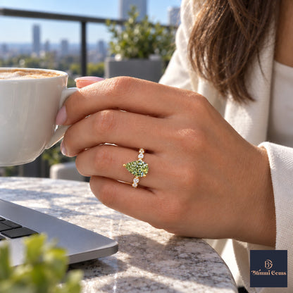 Green Pear Cut Lab Grown Diamond Engagement Ring - Navette Band in yellow gold, worn on the hand