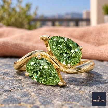 Green Pear Cut Lab Grown Diamond Engagement Ring - Toi et Moi in yellow gold, close-up